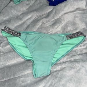 Womens large teal swimsuit bottoms.